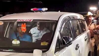 JD(S) MLA HD Revanna being taken into custody by officials of a Special Investigation Team in a kidnapping case, on Saturday. (PTI)