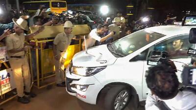 Karnataka JD(S) leader HD Revanna being taken into custody by officials of a Special Investigation Team in a woman’s kidnapping case on Saturday. (PTI) Karnataka JD(S) leader HD Revanna being taken into custody by officials of a Special Investigation Team in a woman’s kidnapping case on Saturday. (PTI)