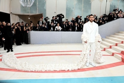 Bad Bunny rocked an all white ensemble in Jacquemus. (Getty images) Bad Bunny rocked an all white ensemble in Jacquemus. (Getty images)