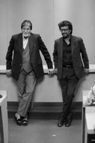 In the pictures, both the actors are dressed in suits. In the pictures, both the actors are dressed in suits.