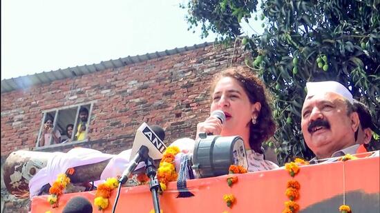 Congress general secretary Priyanka Gandhi Vadra addresses supporters at the party office before the filing of nomination by party candidate from Amethi Kishori Lal Sharma. (ANI PHOTO)