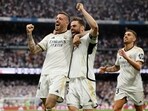 Real Madrid's Spanish forward #14 Joselu (L) celebrates scoring his team's third goal, with Real Madrid's Spanish defender #06 Nacho Fernandez vs Cadiz Real Madrid's Spanish forward #14 Joselu (L) celebrates scoring his team's third goal, with Real Madrid's Spanish defender #06 Nacho Fernandez vs Cadiz