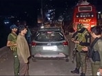 Security personnel stand guard after a militant attack on army vehicles, in Poonch district, Saturday, May 4, 2024.