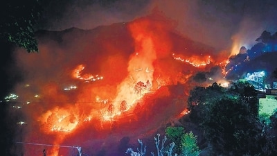 A fire tears through a forest near Saterakhal village in Rudraprayag district of Uttarakhand. (PTI) (HT_PRINT) A fire tears through a forest near Saterakhal village in Rudraprayag district of Uttarakhand. (PTI) (HT_PRINT)