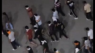 A still from the purported video showing armed assailants heading towards an eatery. (HT photo)