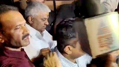 JD(S) leader HD Revanna being taken into custody by SIT officials in connection with a kidnapping case registered against him at KR Nagar police station in Bengaluru on Saturday. (ANI) JD(S) leader HD Revanna being taken into custody by SIT officials in connection with a kidnapping case registered against him at KR Nagar police station in Bengaluru on Saturday. (ANI)