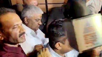 JD(S) leader HD Revanna being taken into custody by SIT officials in connection with a kidnapping case registered against him at KR Nagar police station in Bengaluru on Saturday. (ANI) JD(S) leader HD Revanna being taken into custody by SIT officials in connection with a kidnapping case registered against him at KR Nagar police station in Bengaluru on Saturday. (ANI)
