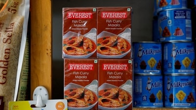 Boxes of Everest fish curry masala are stacked on the shelf of a shop at a market in Srinagar. (REUTERS file)