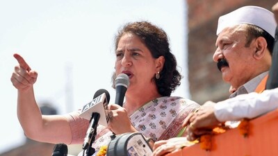 Kishori Lal Sharma with Priyanka Gandhi Vadra in Amethi. (PTI file photo) Kishori Lal Sharma with Priyanka Gandhi Vadra in Amethi. (PTI file photo)