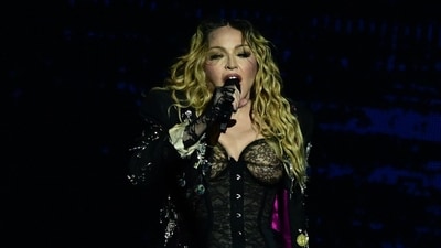 Madonna performs onstage during a free concert at Copacabana beach in Rio de Janeiro, Brazil, on May 4. (AFP) Madonna performs onstage during a free concert at Copacabana beach in Rio de Janeiro, Brazil, on May 4. (AFP)