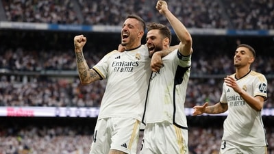 Real Madrid's Spanish forward #14 Joselu (L) celebrates scoring his team's third goal, with Real Madrid's Spanish defender #06 Nacho Fernandez vs Cadiz (AFP) Real Madrid's Spanish forward #14 Joselu (L) celebrates scoring his team's third goal, with Real Madrid's Spanish defender #06 Nacho Fernandez vs Cadiz (AFP)