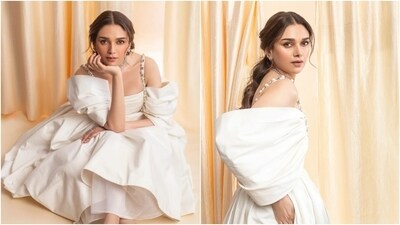 Aditi Rao Hydari knows how to effortlessly bring a fresh, summery lightness to cocktail party dresses with her steal-worthy sartorial roster. One look at her most recent outing in a glamorous ivory ensemble and you would agree. The Heeramandi actor attended an awards show recently dressed in a cotton cropped blouse and a voluminous skirt. Keep scrolling to see her pictures in the outfit. (Instagram) Aditi Rao Hydari knows how to effortlessly bring a fresh, summery lightness to cocktail party dresses with her steal-worthy sartorial roster. One look at her most recent outing in a glamorous ivory ensemble and you would agree. The Heeramandi actor attended an awards show recently dressed in a cotton cropped blouse and a voluminous skirt. Keep scrolling to see her pictures in the outfit. (Instagram)
