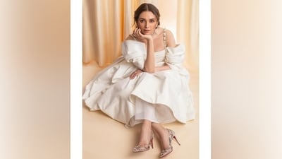 Aditi accessorised the ensemble with minimal additions, including clear embellished pumps from Christian Louboutin, a layered silver choker necklace, stacked earrings adorned with pearls and diamonds, and dainty statement rings. (Instagram) Aditi accessorised the ensemble with minimal additions, including clear embellished pumps from Christian Louboutin, a layered silver choker necklace, stacked earrings adorned with pearls and diamonds, and dainty statement rings. (Instagram)