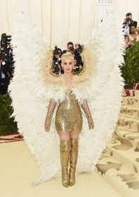 Katy Perry wore angel wings and all white to the 2018 met gala. (Getty Images) Katy Perry wore angel wings and all white to the 2018 met gala. (Getty Images)