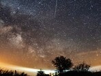 FILE - The Lyrid meteor shower is seen over Burg on the Baltic Sea island of Fehmarn off Germany, Friday, April 20, 2018. The Lyrids occur every year in mid-to-late April. Peak activity for 2024 happens Sunday, April 21 into Monday, April 22, with 10 to 20 meteors expected per hour, weather permitting. Viewing lasts through April 29. (Daniel Reinhardt/dpa via AP, File) FILE - The Lyrid meteor shower is seen over Burg on the Baltic Sea island of Fehmarn off Germany, Friday, April 20, 2018. The Lyrids occur every year in mid-to-late April. Peak activity for 2024 happens Sunday, April 21 into Monday, April 22, with 10 to 20 meteors expected per hour, weather permitting. Viewing lasts through April 29. (Daniel Reinhardt/dpa via AP, File)