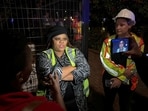 Theresa Jeyi who claims to have witnessed a building under construction collapse, talks to media at the scene in George, South Africa 