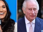 Royal expert reveals ‘rare honour’ King Charles gifted Meghan Markle (Photo by SUZANNE CORDEIRO / AFP, photo by HENRY NICHOLLS / AFP)