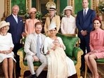 This official handout Christening photograph released by the Duke and Duchess of Sussex shows Britain's Prince Harry, Duke of Sussex (centre left), and his wife Meghan, Duchess of Sussex holding their baby son, Archie Harrison Mountbatten-Windsor flanked by (L-R) Britain's Camilla, Duchess of Cornwall, Britain's Prince Charles, Prince of Wales, Ms Doria Ragland, Lady Jane Fellowes, Lady Sarah McCorquodale, Britain's Prince William, Duke of Cambridge, and Britain's Catherine, Duchess of Cambridge in the Green Drawing Room at Windsor Castle, west of London on July 6, 2019. This official handout Christening photograph released by the Duke and Duchess of Sussex shows Britain's Prince Harry, Duke of Sussex (centre left), and his wife Meghan, Duchess of Sussex holding their baby son, Archie Harrison Mountbatten-Windsor flanked by (L-R) Britain's Camilla, Duchess of Cornwall, Britain's Prince Charles, Prince of Wales, Ms Doria Ragland, Lady Jane Fellowes, Lady Sarah McCorquodale, Britain's Prince William, Duke of Cambridge, and Britain's Catherine, Duchess of Cambridge in the Green Drawing Room at Windsor Castle, west of London on July 6, 2019.