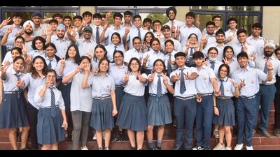 Class 12 students of Sat Paul Mittal School celebrating after the ICSE result declared in Ludhiana on Monday. (Gurpreet Singh/HT) Class 12 students of Sat Paul Mittal School celebrating after the ICSE result declared in Ludhiana on Monday. (Gurpreet Singh/HT)
