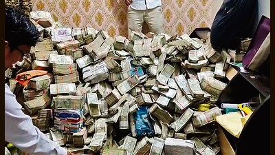 ED officials during the raid in Ranchi on Monday. (ANI) ED officials during the raid in Ranchi on Monday. (ANI)