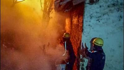 Forest personnel attempt to control the fire that broke out in the forest of Uttarakhand’s Nainital district on Friday. (ANI) Forest personnel attempt to control the fire that broke out in the forest of Uttarakhand’s Nainital district on Friday. (ANI)