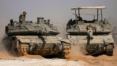 Israel-Hamas war updates: Israeli soldiers drive a tank at a staging ground near the border with the Gaza Strip, in southern Israel, Sunday, May 5, 2024. (AP Photo/Tsafrir Abayov) Israel-Hamas war updates: Israeli soldiers drive a tank at a staging ground near the border with the Gaza Strip, in southern Israel, Sunday, May 5, 2024. (AP Photo/Tsafrir Abayov)