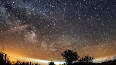 FILE - The Lyrid meteor shower is seen over Burg on the Baltic Sea island of Fehmarn off Germany, Friday, April 20, 2018. The Lyrids occur every year in mid-to-late April. Peak activity for 2024 happens Sunday, April 21 into Monday, April 22, with 10 to 20 meteors expected per hour, weather permitting. Viewing lasts through April 29. (Daniel Reinhardt/dpa via AP, File) (AP) FILE - The Lyrid meteor shower is seen over Burg on the Baltic Sea island of Fehmarn off Germany, Friday, April 20, 2018. The Lyrids occur every year in mid-to-late April. Peak activity for 2024 happens Sunday, April 21 into Monday, April 22, with 10 to 20 meteors expected per hour, weather permitting. Viewing lasts through April 29. (Daniel Reinhardt/dpa via AP, File) (AP)