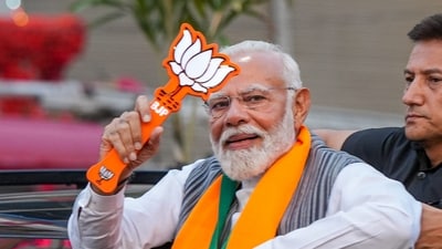 Prime Minister Narendra Modi during a roadshow for Lok Sabha elections. (PTI) Prime Minister Narendra Modi during a roadshow for Lok Sabha elections. (PTI)