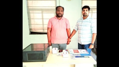 The accused in police custody in Lucknow on Monday (HT Photo) The accused in police custody in Lucknow on Monday (HT Photo)