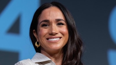 Meghan Markle scrambling after the launch of her forthcoming podcast was pushed back (Photo by SUZANNE CORDEIRO / AFP) (AFP) Meghan Markle scrambling after the launch of her forthcoming podcast was pushed back (Photo by SUZANNE CORDEIRO / AFP) (AFP)