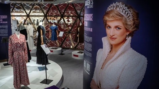 Dresses worn by Princess Diana are displayed at the media preview ahead of the auction of the Princess Diana's Elegance & A Royal Collection in Hong Kong, Wednesday, April, 17, 2024. (AP Photo/Vernon Yuen) (AP)