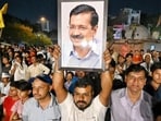 AAP workers hold up Arvind Kejriwal’s photo during their Lok Sabha election campaign. (Sanchit Khanna/HT Photo) AAP workers hold up Arvind Kejriwal’s photo during their Lok Sabha election campaign. (Sanchit Khanna/HT Photo)