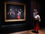 An artwork entitled "Martyrdom of Saint Ursula" by Italian artist Michelangelo Merisi da Caravaggio is pictured during a photocall at the National Gallery in London on April 16, 2024, ahead of the gallery's 'The Last Caravaggio' exhibition. The painting is set to be displayed from April 18 until July 21. 