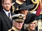 FILE PHOTO: Britain's Meghan, Duchess of Sussex, cries as she, Prince Harry, Duke of Sussex, Queen Camilla and King Charles attend the state funeral and burial of Britain's Queen Elizabeth, in London, Britain, September 19, 2022.       REUTERS/Toby Melville/File Photo