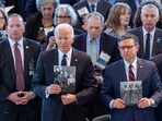 President Joe Biden, left, and Speaker of the House Mike Johnson, R-La., stand to honor the memory of the 6 million Jews killed in the Holocaust during the annual Days of Remembrance ceremony, at the Capitol in Washington, Tuesday, May 7, 2024. (AP Photo/J. Scott Applewhite) President Joe Biden, left, and Speaker of the House Mike Johnson, R-La., stand to honor the memory of the 6 million Jews killed in the Holocaust during the annual Days of Remembrance ceremony, at the Capitol in Washington, Tuesday, May 7, 2024. (AP Photo/J. Scott Applewhite)