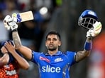 Mumbai Indians' Suryakumar Yadav celebrates after scoring a century as his team wins against Sunrisers Hyderabad