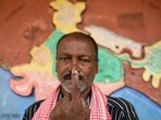 Manusha, a voter from the Hakki Pikki tribal community displays his inked finger after casting his ballot at a polling station during the third phase of voting for the India's general election, at Sadashivapura village of Shimoga district in Karnataka, on May 7, 2024. Manusha, a voter from the Hakki Pikki tribal community displays his inked finger after casting his ballot at a polling station during the third phase of voting for the India's general election, at Sadashivapura village of Shimoga district in Karnataka, on May 7, 2024.
