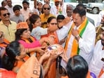 Satara: BJP candidate from Satara Lok Sabha seat Udayanraje Bhosale being welcomed by his supporters during the election campaign at Dhebewadi in Satara, Thursday, April 25, 2024. (PTI Photo) (PTI04_25_2024_000141B)