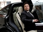Tesla layoffs: Tesla Chief Executive Officer Elon Musk gets in a Tesla car as he leaves a hotel in Beijing, China.