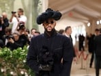 Bad Bunny poses at the Met Gala, an annual fundraising gala held for the benefit of the Metropolitan Museum of Art's Costume Institute. 