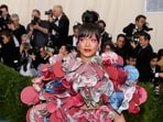 Rihanna arrived on the 2017 Met Gala red carpet in a runway look from Rei Kawakubo's Comme des Garçon fashion collection. Rihanna arrived on the 2017 Met Gala red carpet in a runway look from Rei Kawakubo's Comme des Garçon fashion collection.