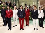 Bang Chan, Han, Felix, Seungmin, Hyunjin, I.N, Lee Know, and Changbin of Stray Kids pose at the Met Gala.