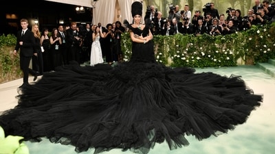 Cardi B stunned at the Met Gala in a voluminous black gown that dominated the staircase. (Evan Agostini/Invision/AP) Cardi B stunned at the Met Gala in a voluminous black gown that dominated the staircase. (Evan Agostini/Invision/AP)