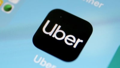 A picture taken on April 11, 2019 shows the global ride-hailing giant, Uber application on a smart phone in Cologne. (Photo by Oliver Berg / dpa / AFP) / Germany OUT (AFP) A picture taken on April 11, 2019 shows the global ride-hailing giant, Uber application on a smart phone in Cologne. (Photo by Oliver Berg / dpa / AFP) / Germany OUT (AFP)