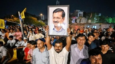 AAP workers hold up Arvind Kejriwal’s photo during their Lok Sabha election campaign. (Sanchit Khanna/HT Photo) AAP workers hold up Arvind Kejriwal’s photo during their Lok Sabha election campaign. (Sanchit Khanna/HT Photo)