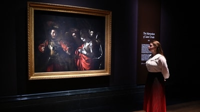 An artwork entitled "Martyrdom of Saint Ursula" by Italian artist Michelangelo Merisi da Caravaggio is pictured during a photocall at the National Gallery in London on April 16, 2024, ahead of the gallery's 'The Last Caravaggio' exhibition. The painting is set to be displayed from April 18 until July 21. (Photo by JUSTIN TALLIS / AFP) An artwork entitled "Martyrdom of Saint Ursula" by Italian artist Michelangelo Merisi da Caravaggio is pictured during a photocall at the National Gallery in London on April 16, 2024, ahead of the gallery's 'The Last Caravaggio' exhibition. The painting is set to be displayed from April 18 until July 21. (Photo by JUSTIN TALLIS / AFP)
