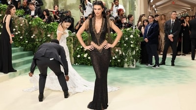 Kendall Jenner's choice for the Met Gala certainly makes fashion history! The revival of an archival piece from Alexander McQueen's 1999 Givenchy collection is truly extraordinary. Given the rarity and significance of the dress, which had only been seen on mannequins and never worn by anyone until Jenner, it must have been a stunning sight on the red carpet. (Getty Images via AFP) Kendall Jenner's choice for the Met Gala certainly makes fashion history! The revival of an archival piece from Alexander McQueen's 1999 Givenchy collection is truly extraordinary. Given the rarity and significance of the dress, which had only been seen on mannequins and never worn by anyone until Jenner, it must have been a stunning sight on the red carpet. (Getty Images via AFP)