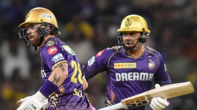 Kolkata Knight Riders' Phil Salt (L) and Sunil Narine run between the wickets (AFP)