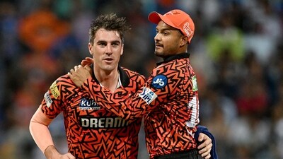 Sunrisers Hyderabad's captain Pat Cummins (L) celebrates with Mayank Agarwal after taking the wicket of Mumbai Indians' Rohit Sharma (not pictured) during the Indian Premier League (IPL) Twenty20 cricket match (AFP) Sunrisers Hyderabad's captain Pat Cummins (L) celebrates with Mayank Agarwal after taking the wicket of Mumbai Indians' Rohit Sharma (not pictured) during the Indian Premier League (IPL) Twenty20 cricket match (AFP)