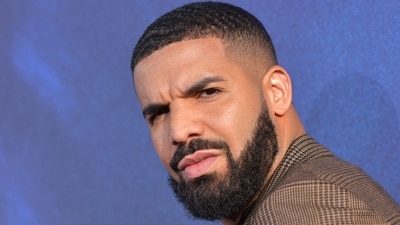 Drake's Toronto house was taped off by cops after shooting outside rapper's mansion left one person gravely injured (AFP) Drake's Toronto house was taped off by cops after shooting outside rapper's mansion left one person gravely injured (AFP)